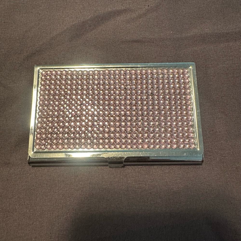 Pink rhinestone business card holder. Some scratches but no stones missing